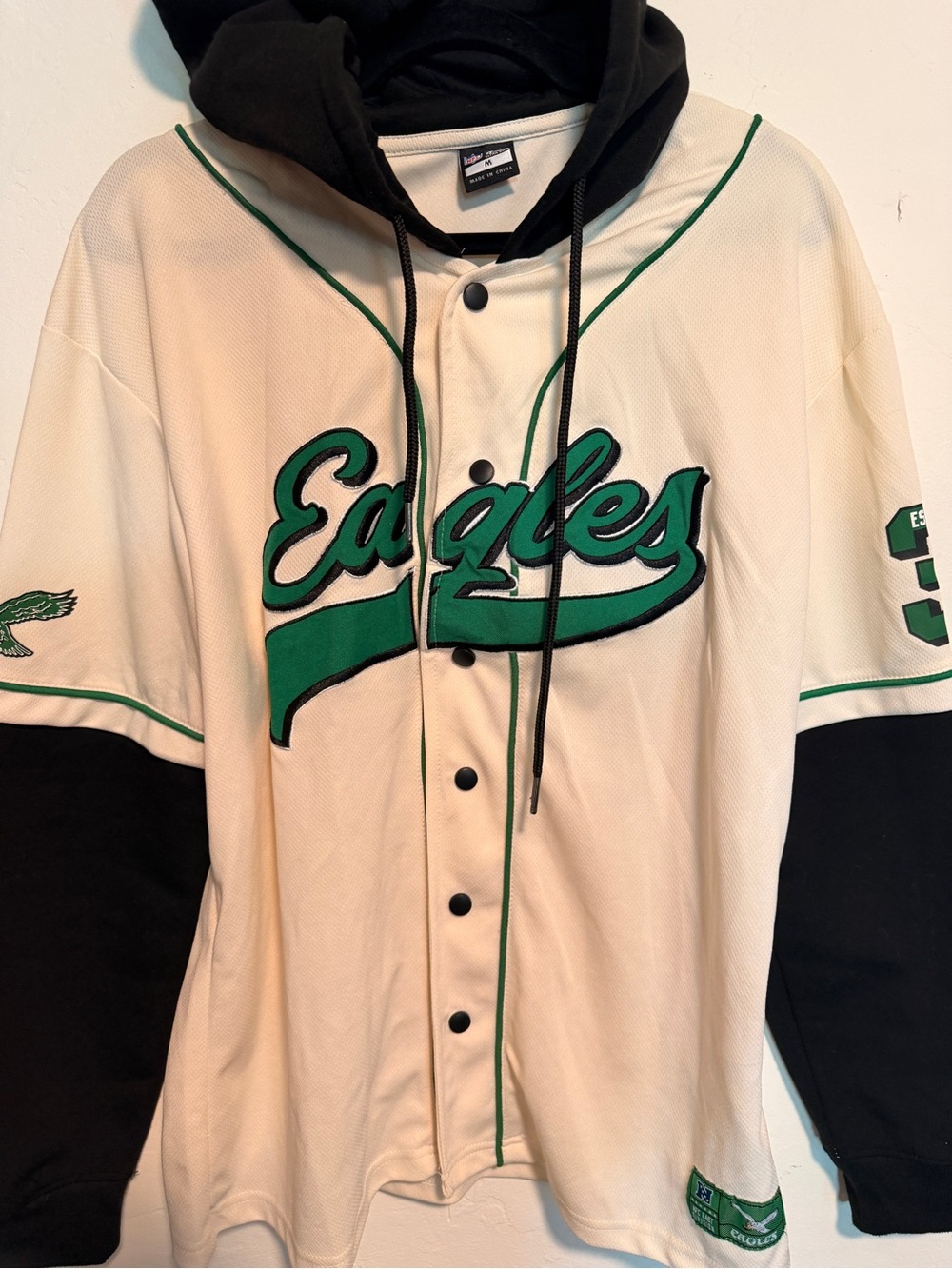 NFL Eagles Two-Tone Hooded Baseball Sweatshirt in Cream, Black & Green